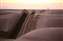 Algodones Sand Dunes Curvy Border Fence in So Cal.jpg