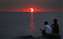 An eclipse and sunset happening simultaneously.jpg