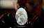 An eggshell with thousands of tiny holes drilled into it.jpg